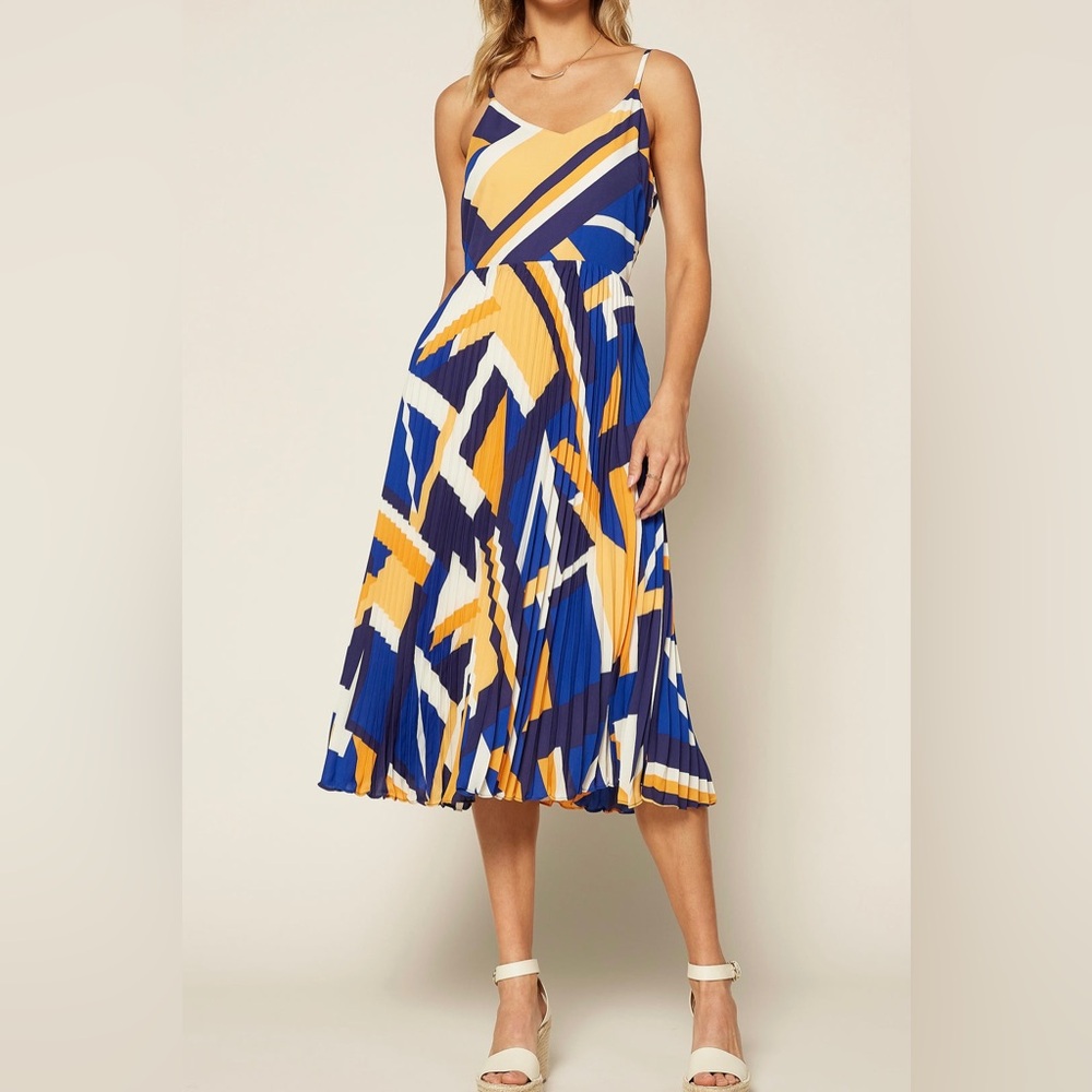Blue geo print midi dress size small, never worn from Ruthie Grace boutique